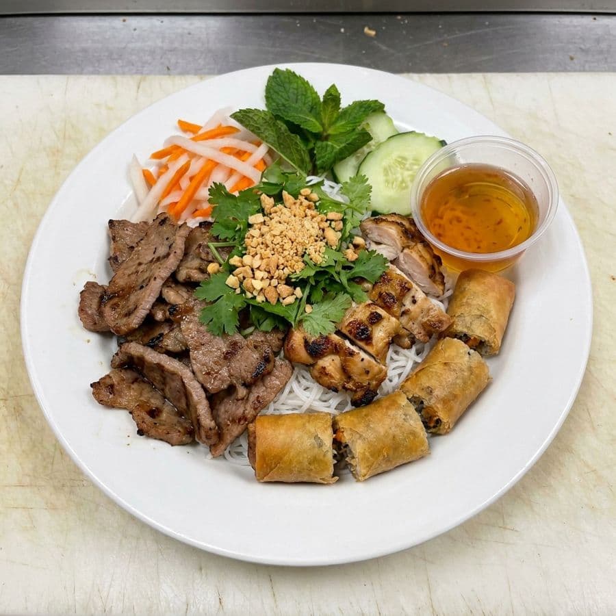 Grilled Pork, Chicken & Spring Roll Vermicelli Bowl